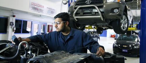 One male Automotive Service Technician student executes some diagnostic tests on an engine.   聽 聽 聽 聽 聽 聽 聽 聽 聽 聽 聽 聽 聽 聽 聽 聽 聽 聽 聽 聽 聽 聽 聽 聽 聽 聽 聽 聽 聽 聽